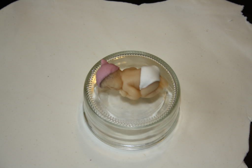 http://i749.photobucket.com/albums/xx133/keukentje1/Babytaart001.jpg